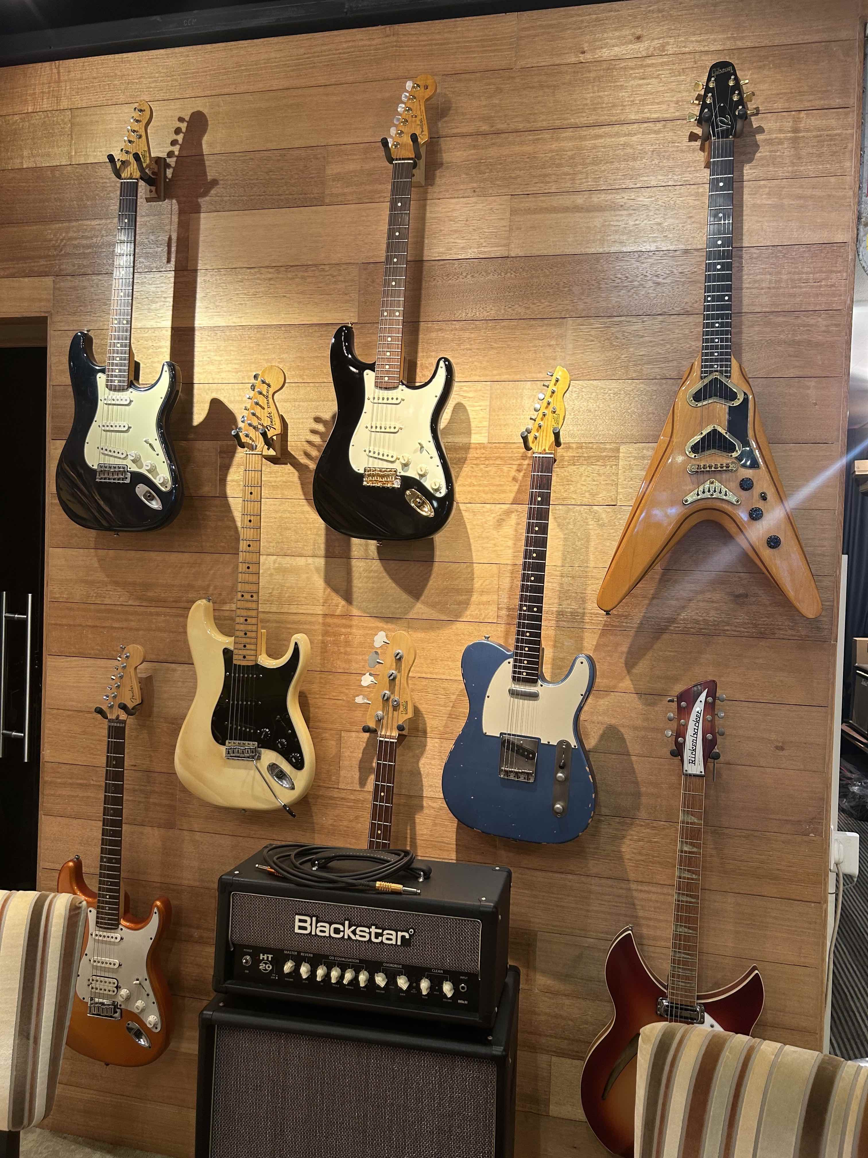 heirlooms-music-singapore-electric-guitars-on-wall